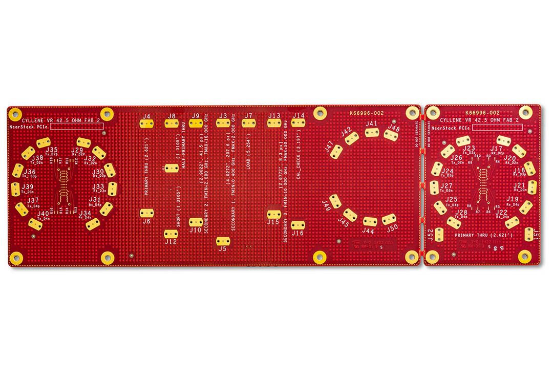 Red circuit board with yellow components.