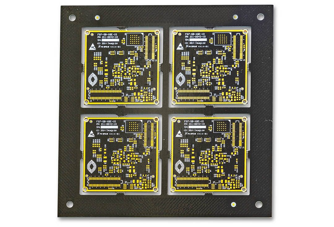 Four printed circuit boards on a panel.
