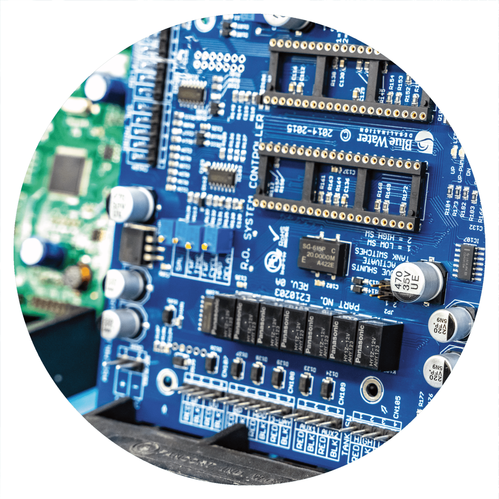 Blue PCB circuit board with electronic components
